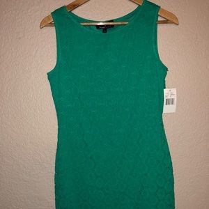 Emerald green Ronni Nicole dress. Knee length.